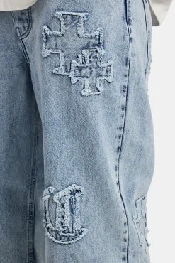 CLO-BOT-DEN Baggy Raw Edge Applique Jeans - Light Blue